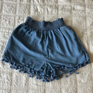 Francesca's TGLA Blue Chambray Smocked Pom Pom Hem Shorts - Size XSmall